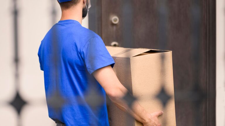 Professional movers handling boxes for a local move in Dubai